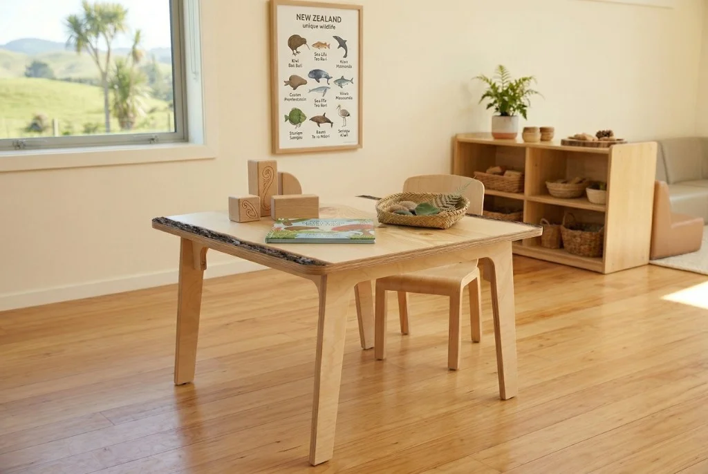 Square timber early learning table with rounded corners and matching chair in a bright NZ-style room with natural materials